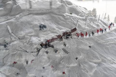 Miniature scene of building a temple